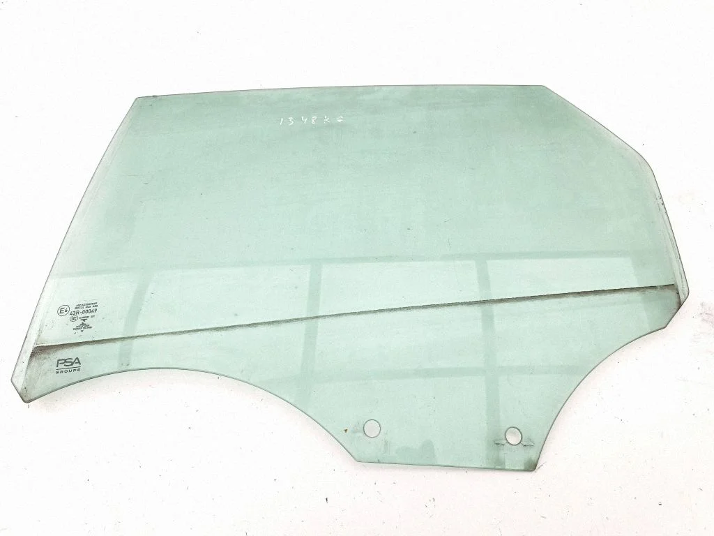 Rear door window glass – left