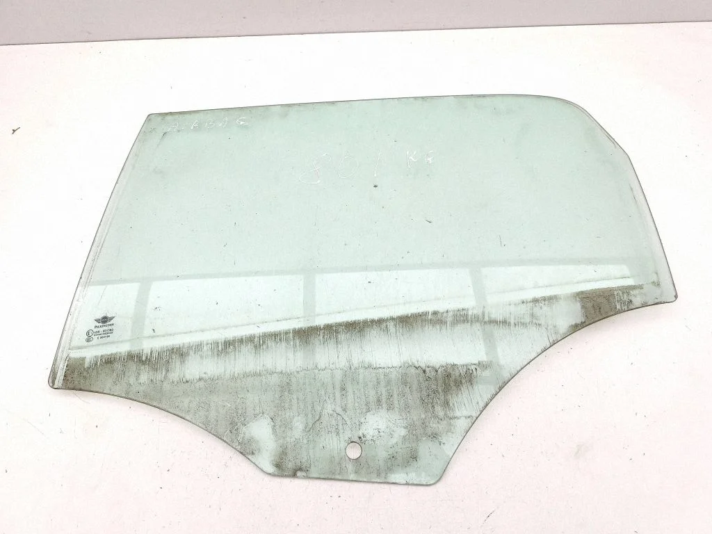 Rear door window glass – left