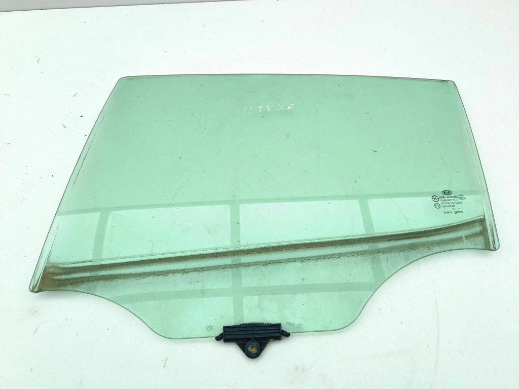 Rear door window glass – left