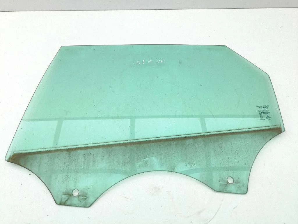 Rear door window glass – left