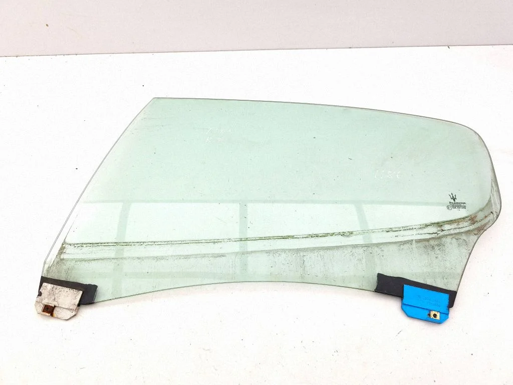 Rear door window glass – left