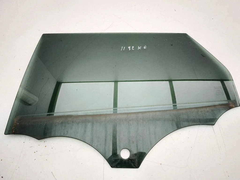 Rear door window glass – left