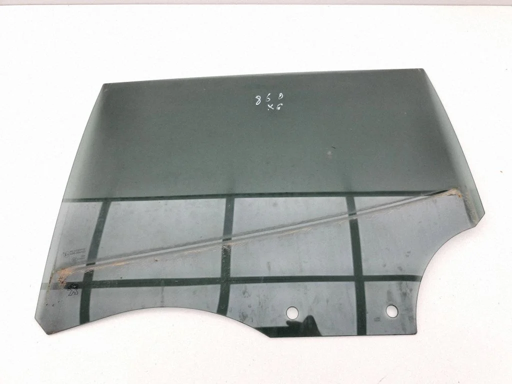 Rear door window glass – left