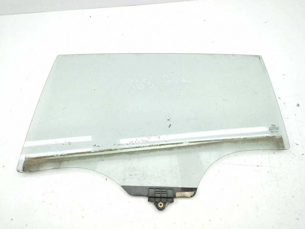 Rear door window glass – left