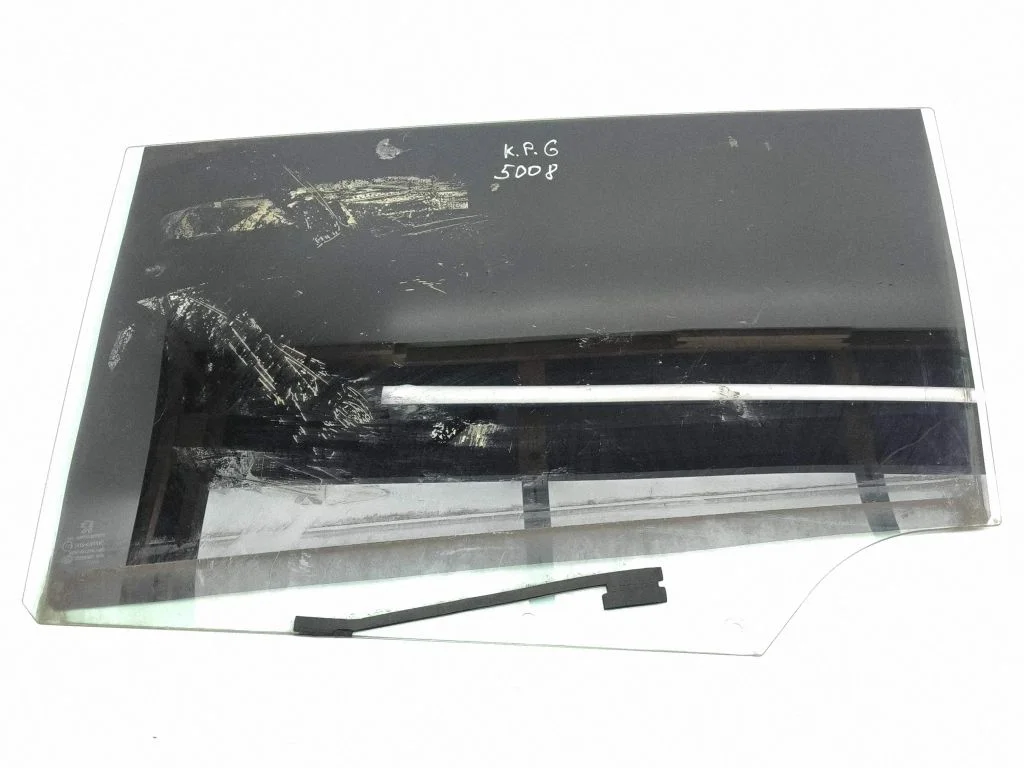 Rear door window glass – left