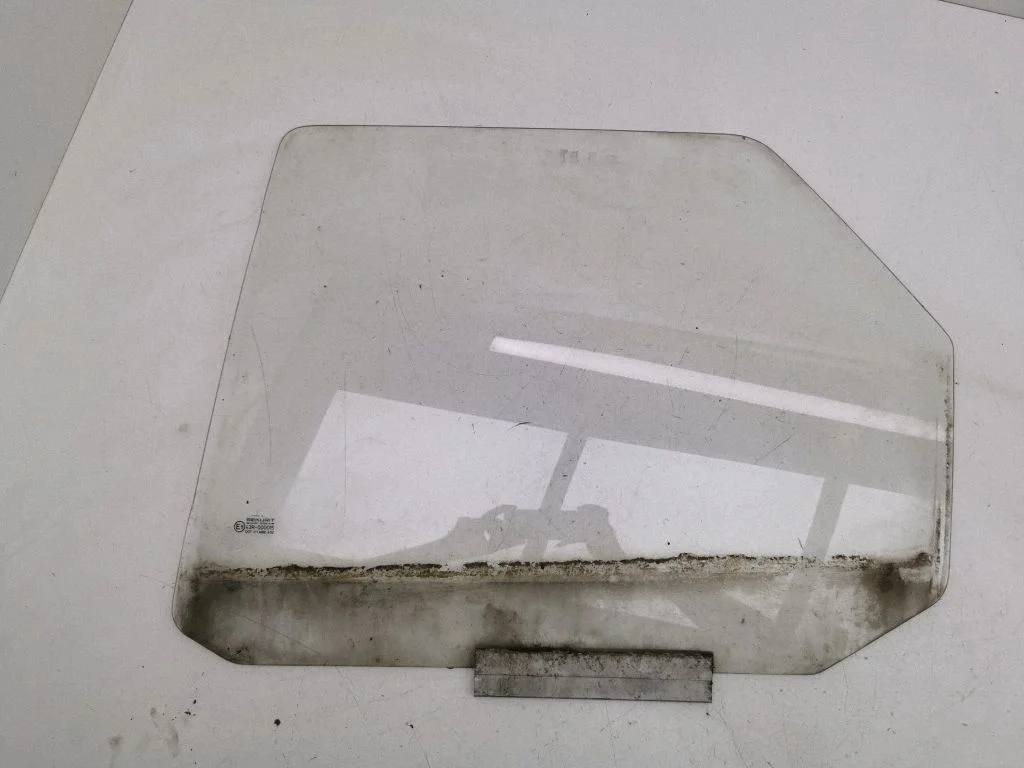 Rear door window glass – Ford Orion (1991-1993), left