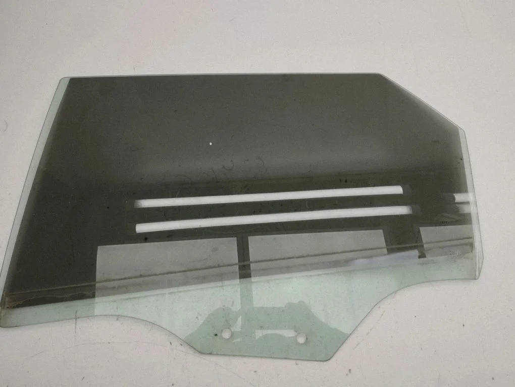 Rear door window glass – left