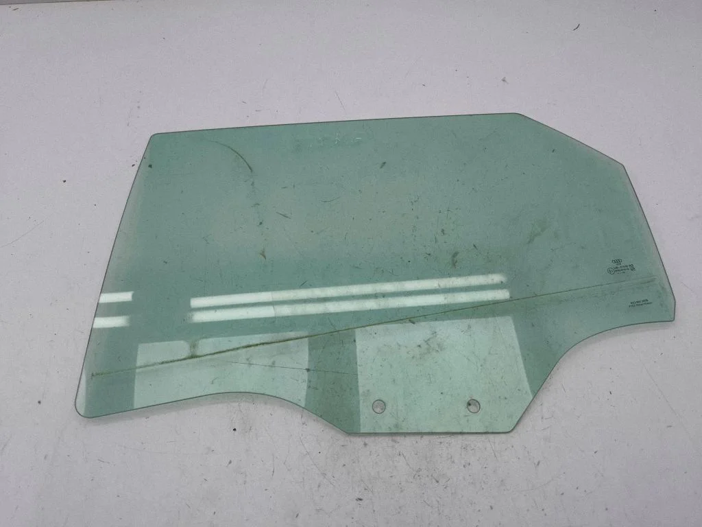 Rear door window glass – left