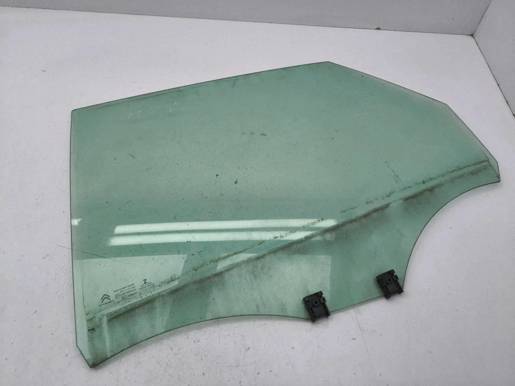 Rear door window glass – left