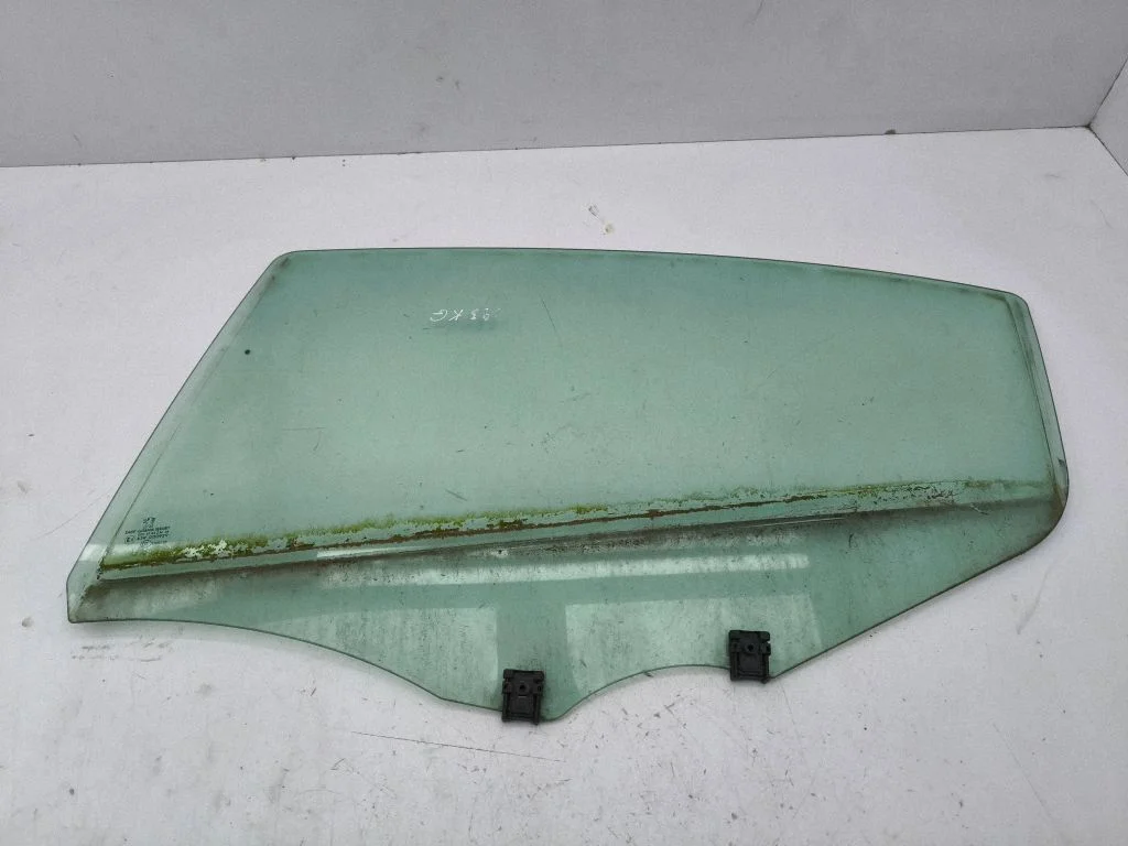 Rear door window glass – left