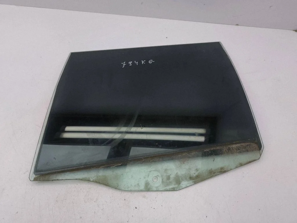 Rear door window glass – left