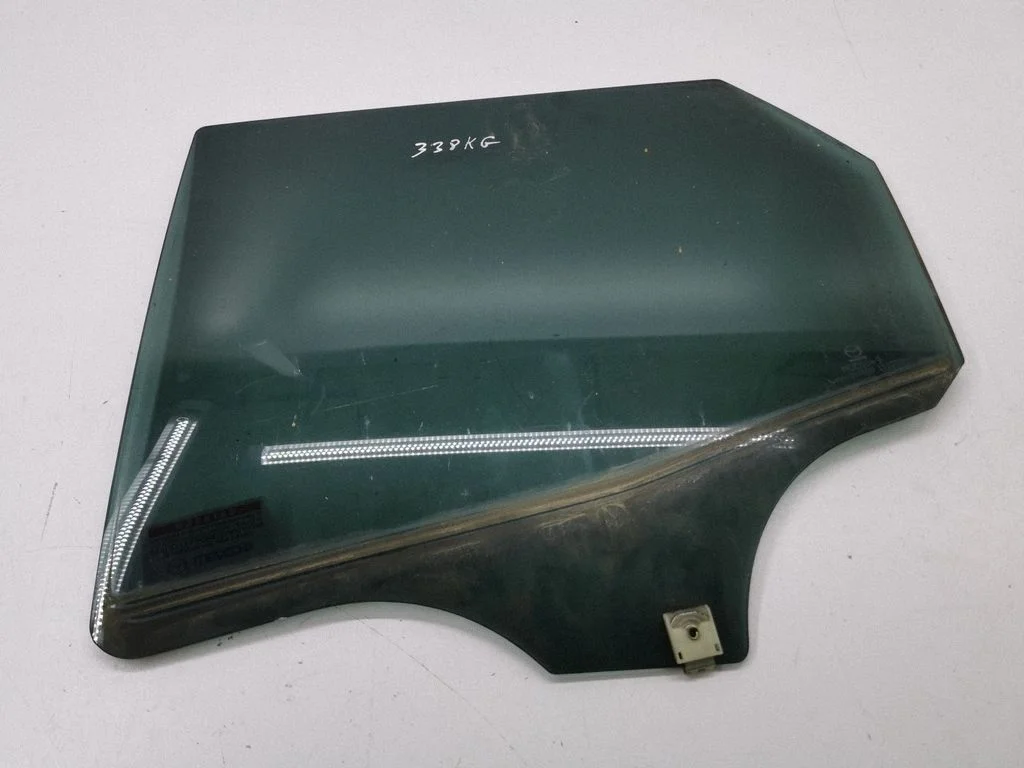 Rear door window glass – left