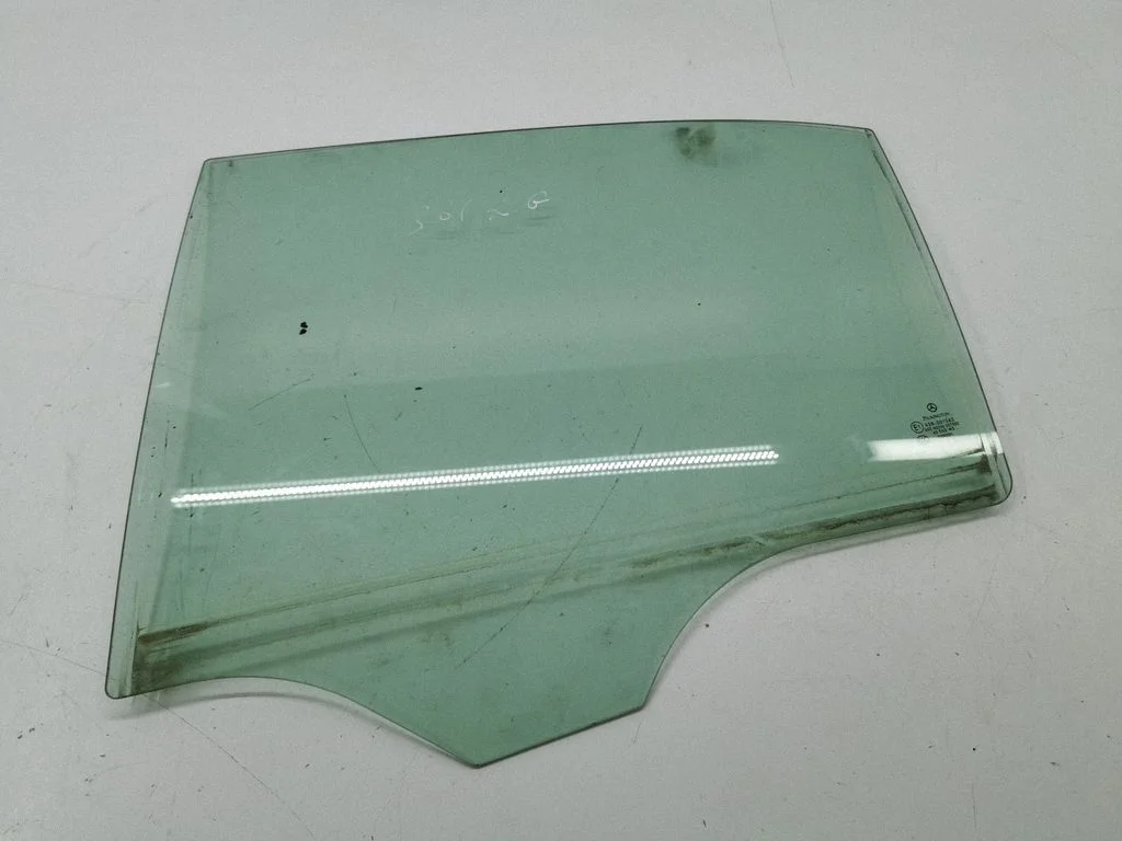 Rear door window glass – left