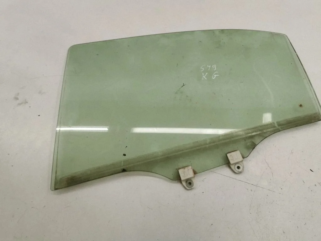 Rear door window glass – left