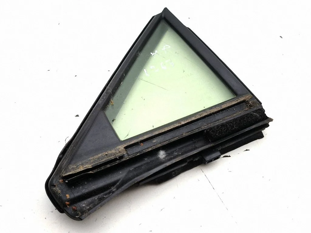 Front door vent window glass four-door – left