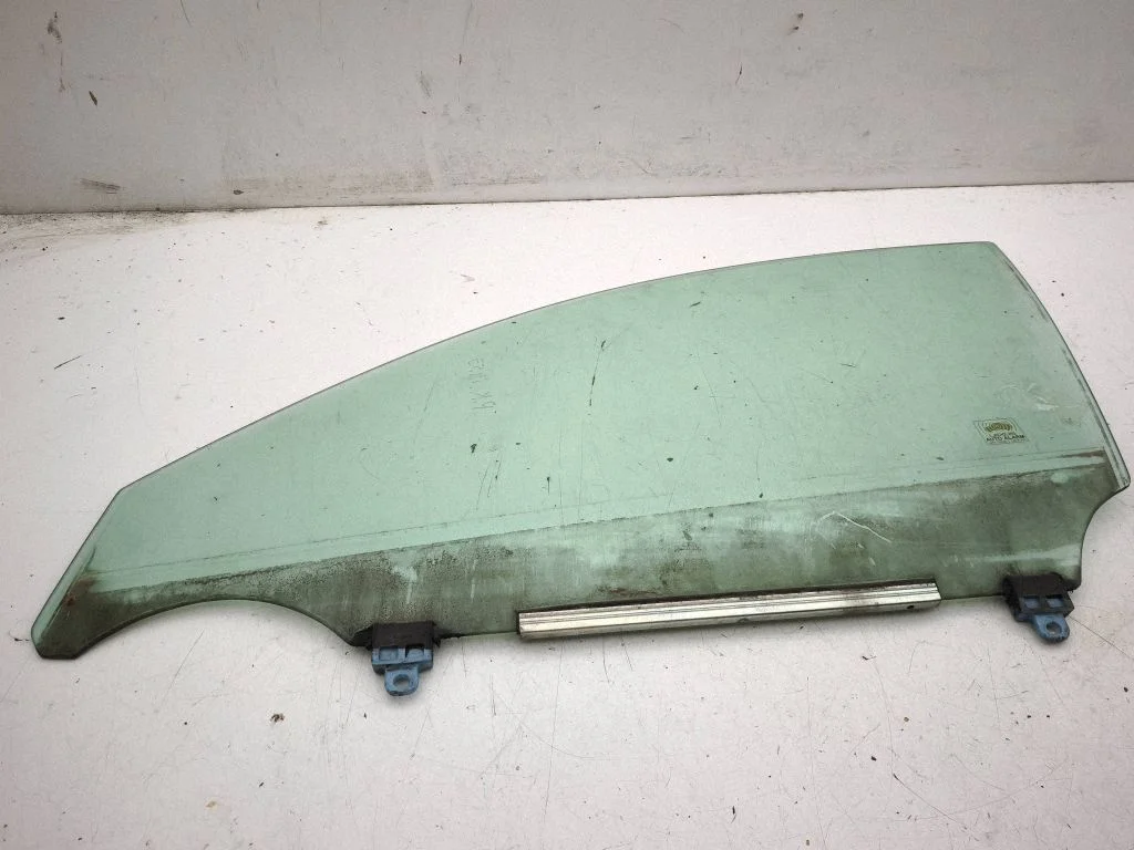 Front door window glass four-door – left