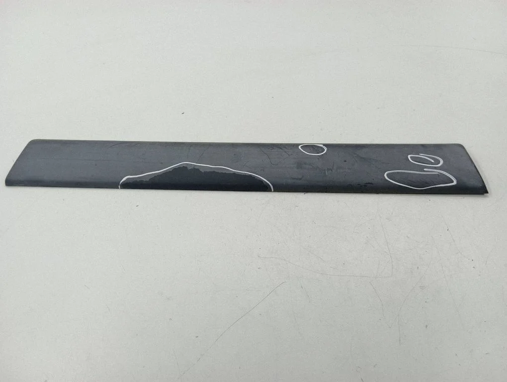 Rear door trim (molding) – left