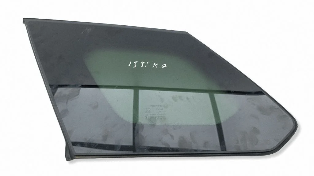 Rear side window – left