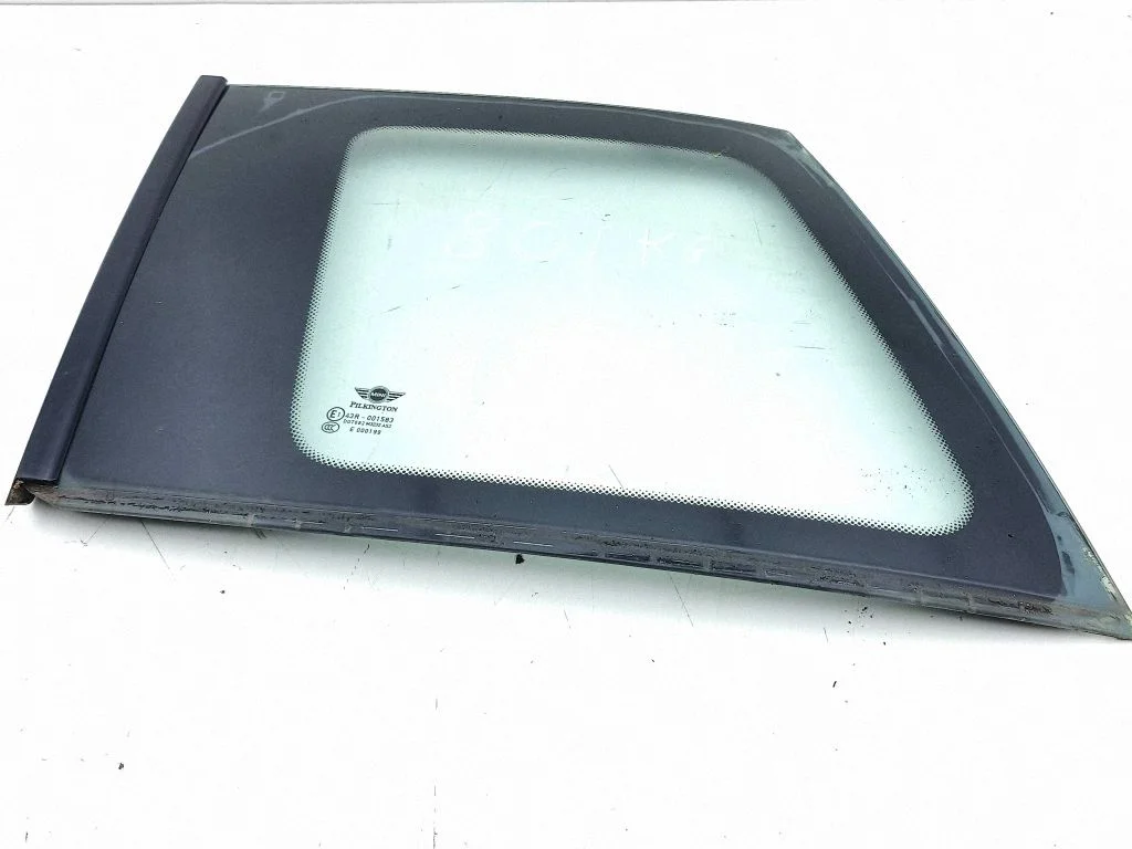 Rear side window – left