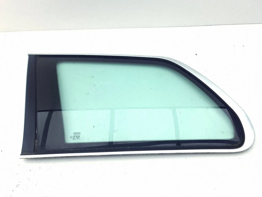 Rear side window – left