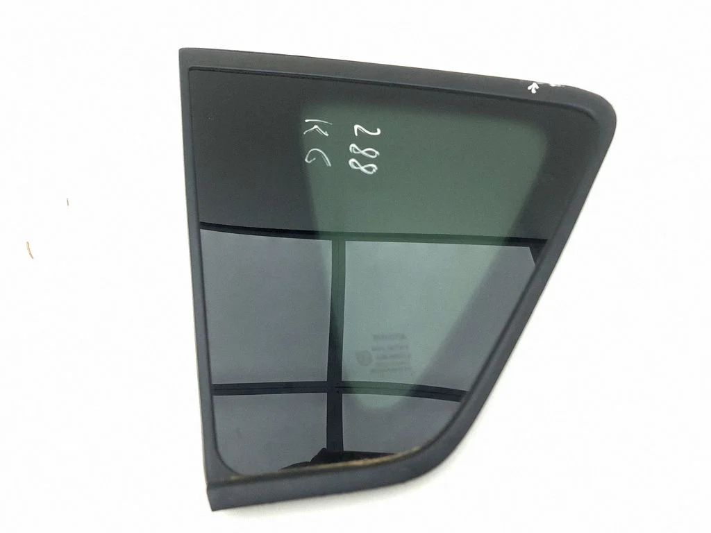 Rear side window – left