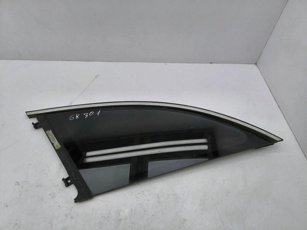 Rear side window – left