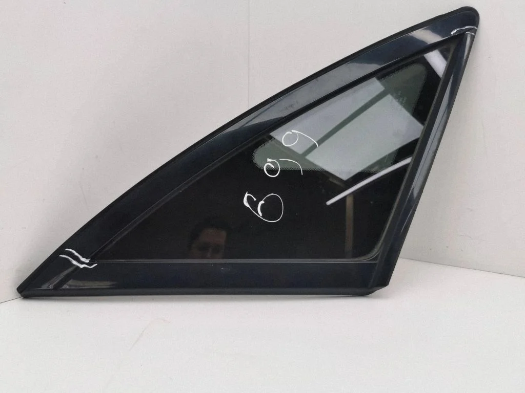 Rear side window – left