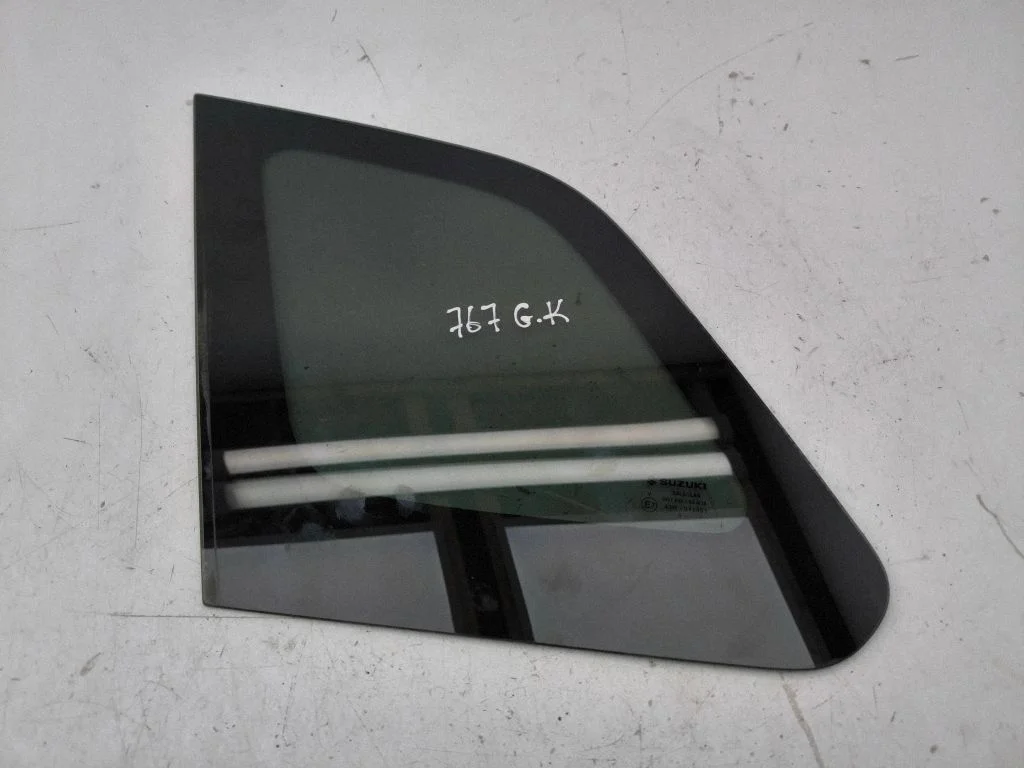 Rear side window – left