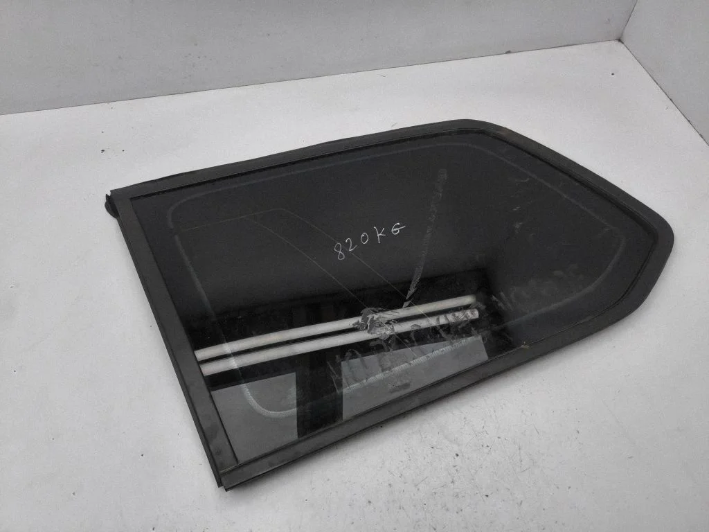 Rear side window – left
