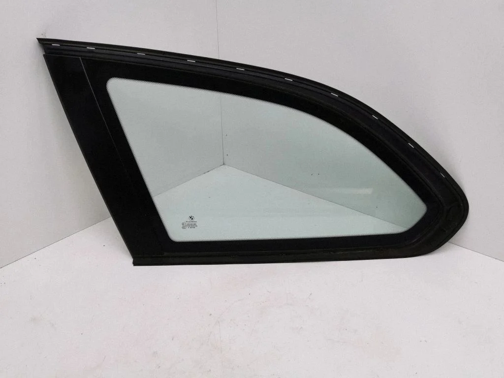 Rear side window – left