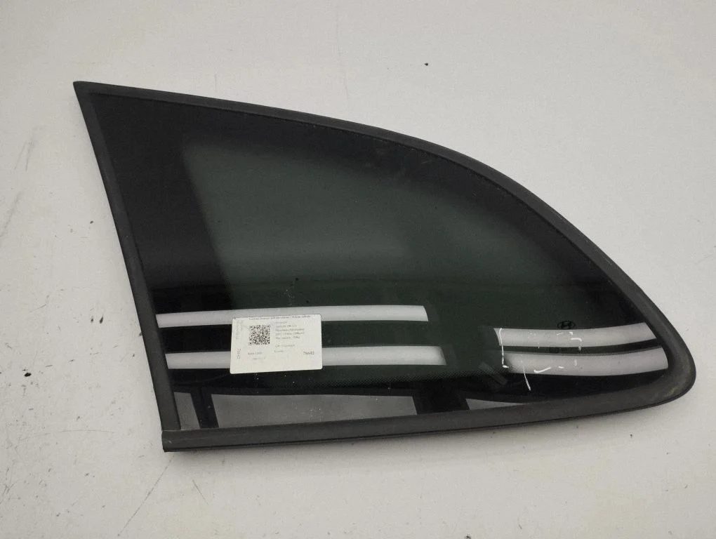 Rear side window – left