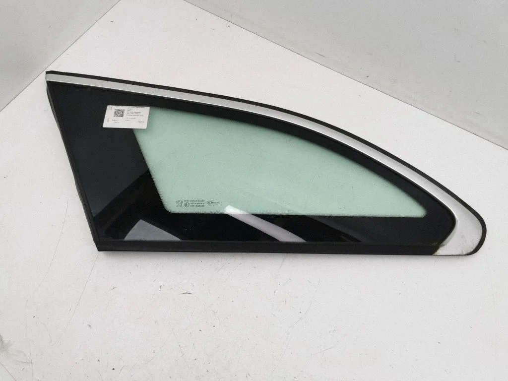 Rear side window – left