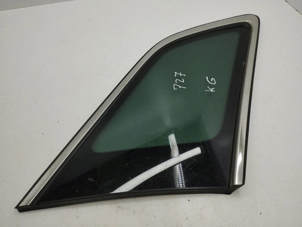 Rear side window – left