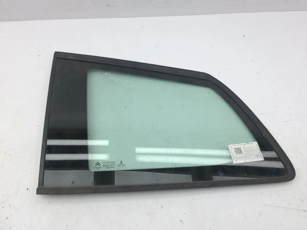 Rear side window – left