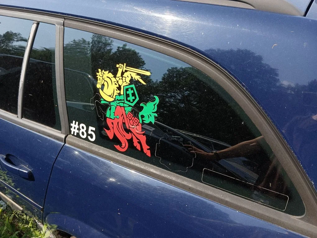 Rear side window – left