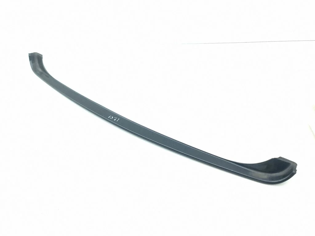Rear bumper trim bar molding