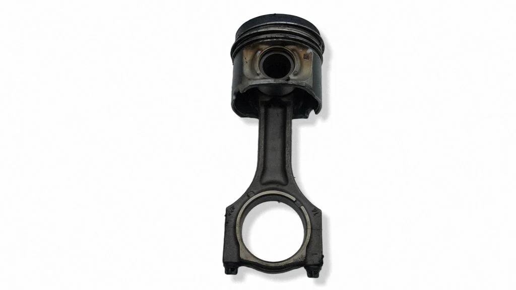 Piston with connecting rod