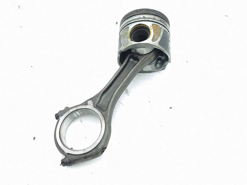 Piston with connecting rod