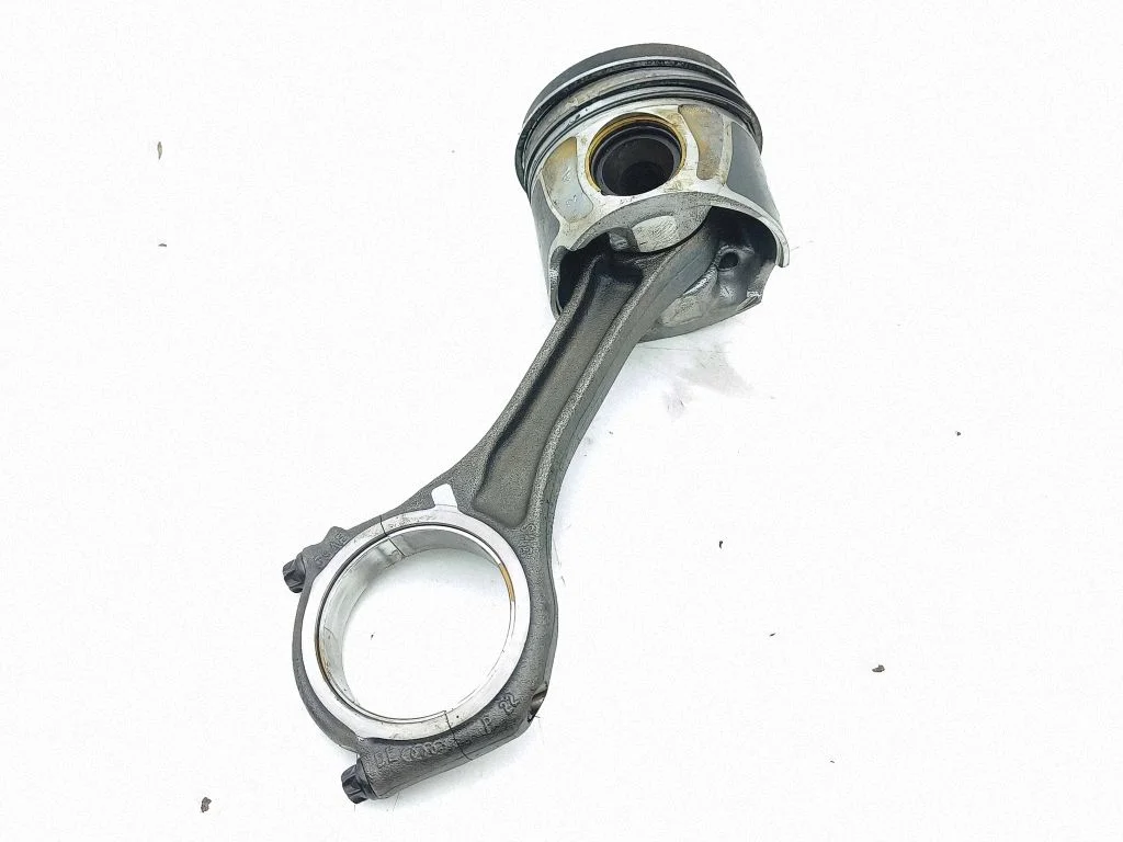 Piston with connecting rod