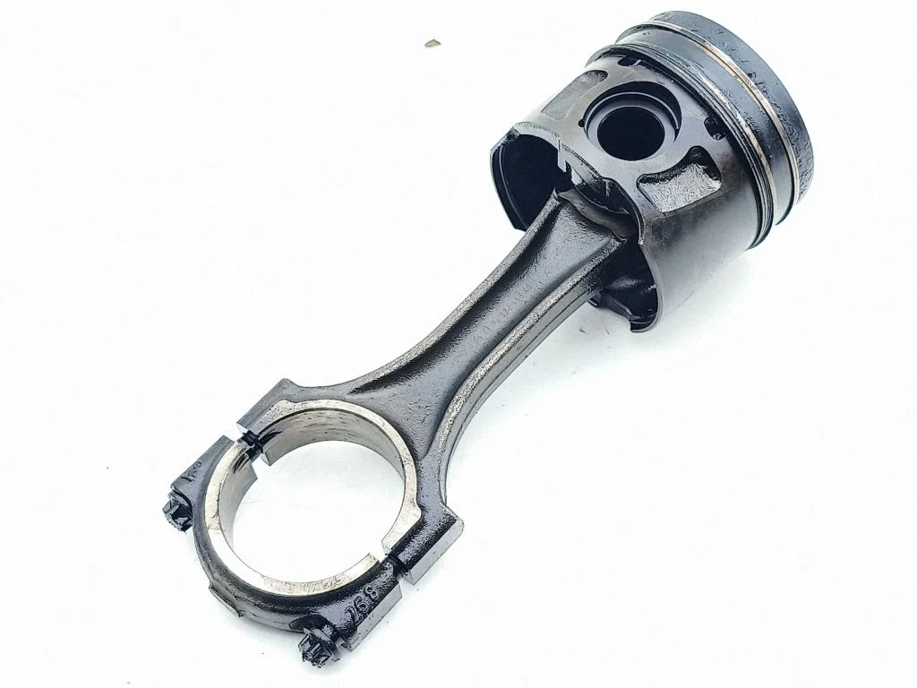 Piston with connecting rod