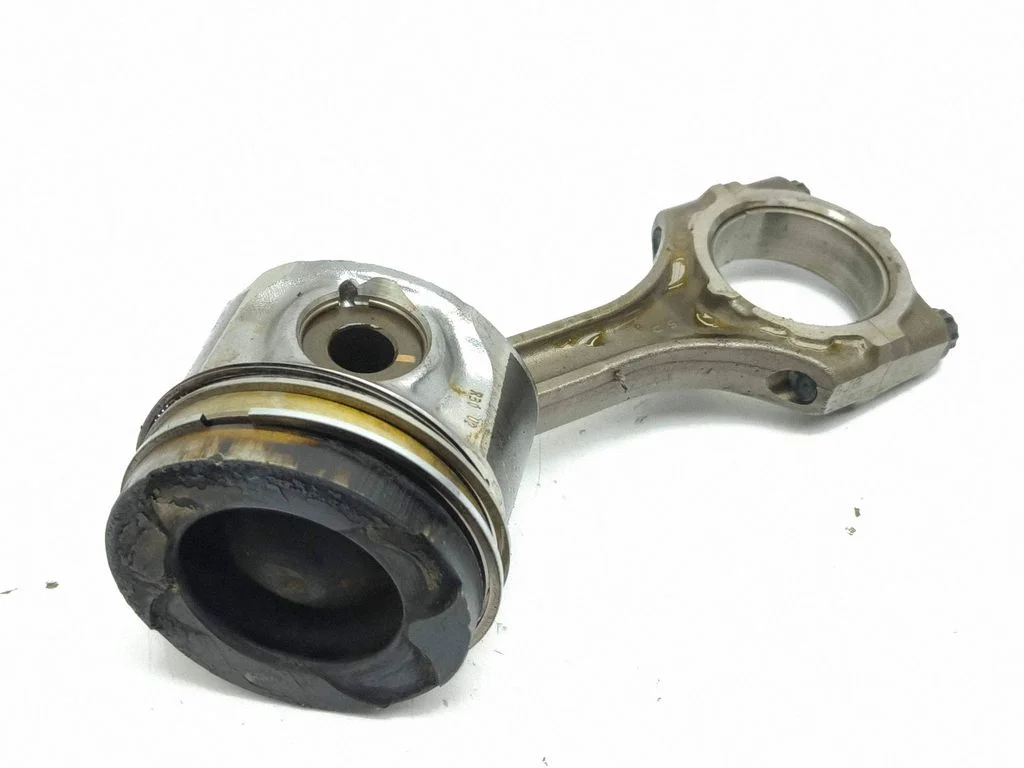 Piston with connecting rod