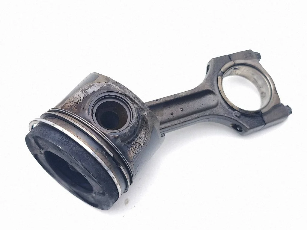 Piston with connecting rod