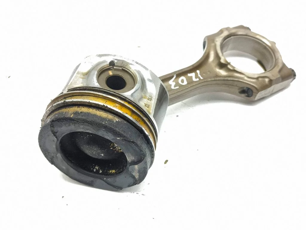 Piston with connecting rod