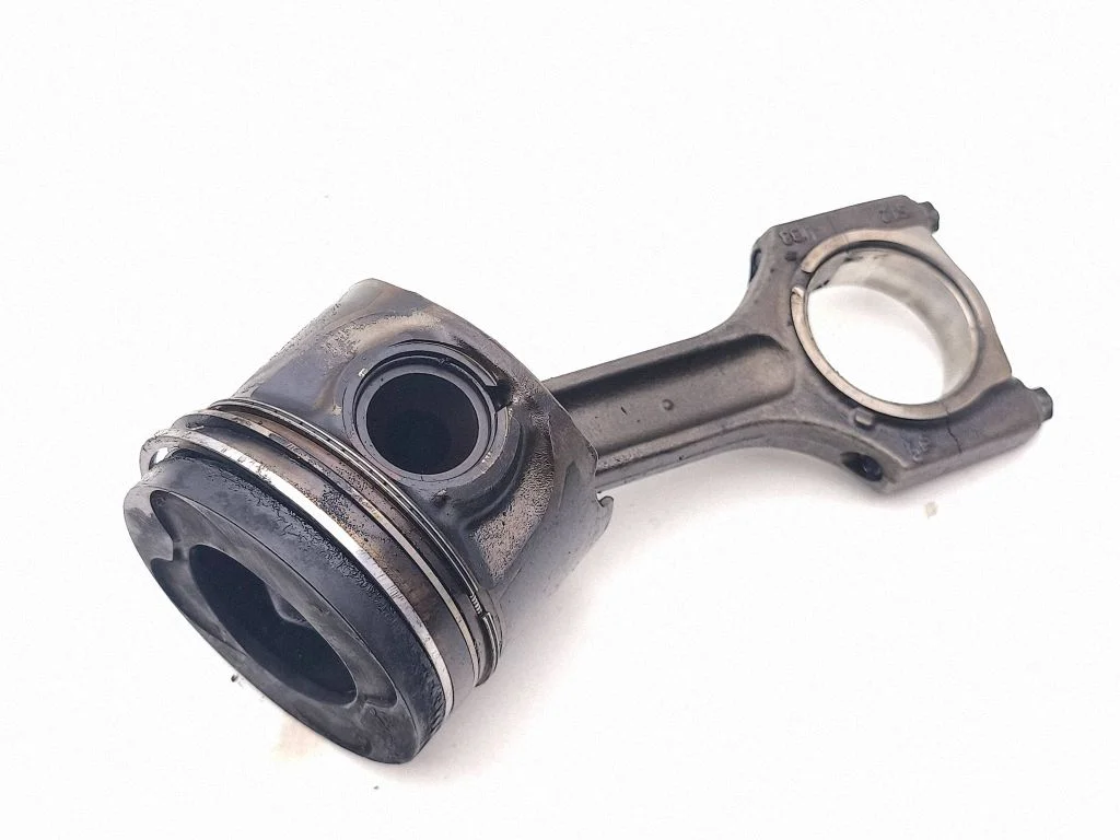 Piston with connecting rod