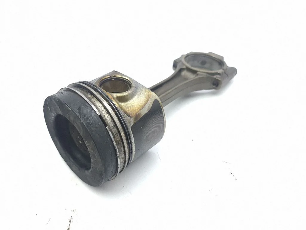 Piston with connecting rod