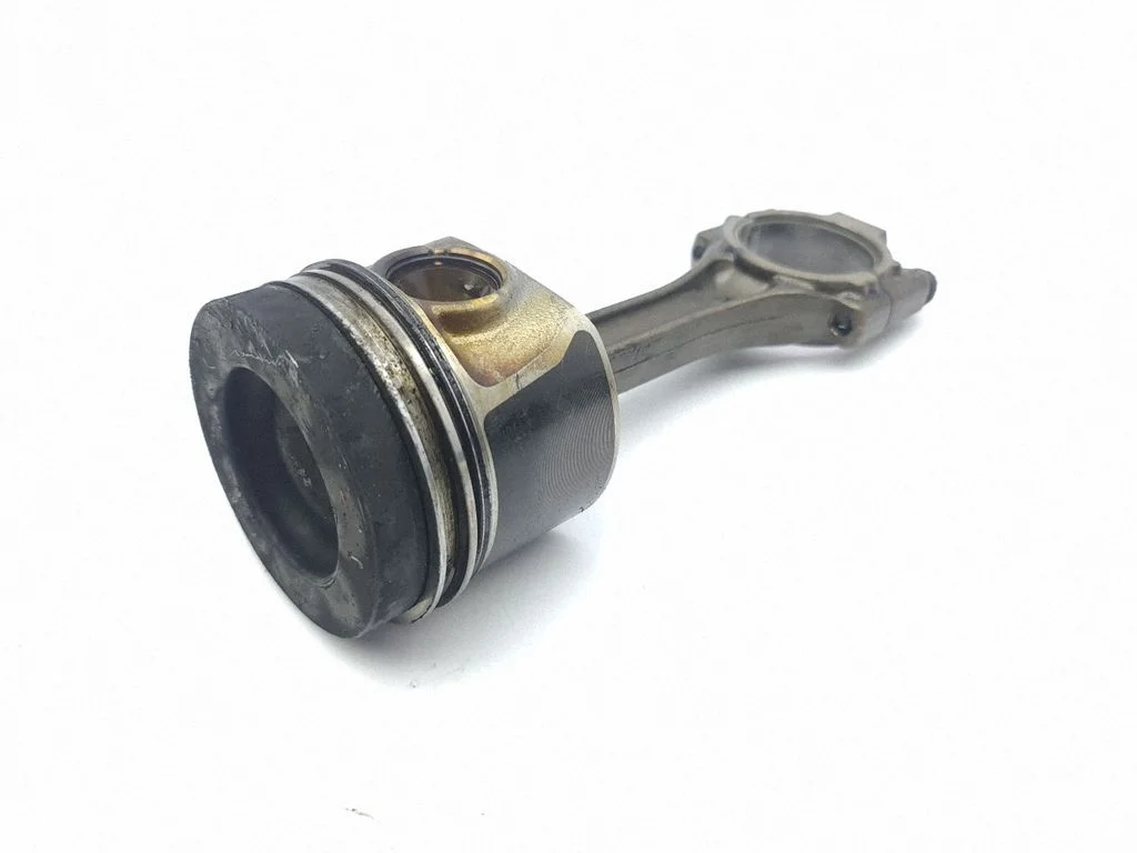 Piston with connecting rod