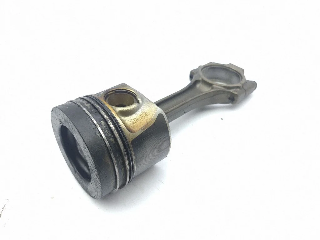 Piston with connecting rod