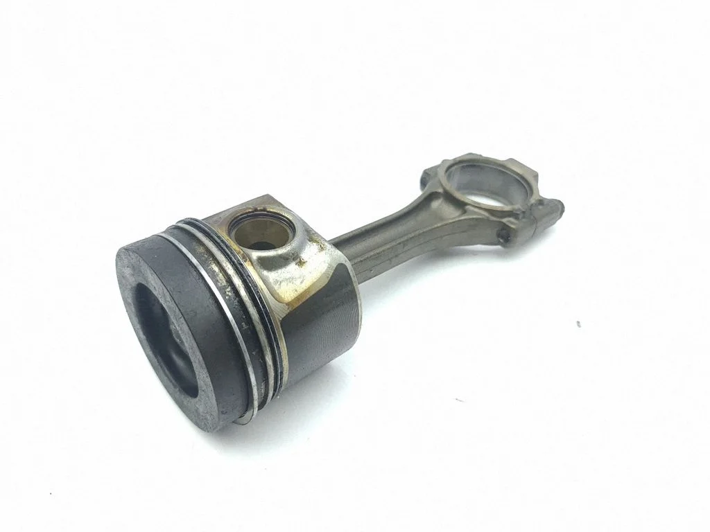 Piston with connecting rod