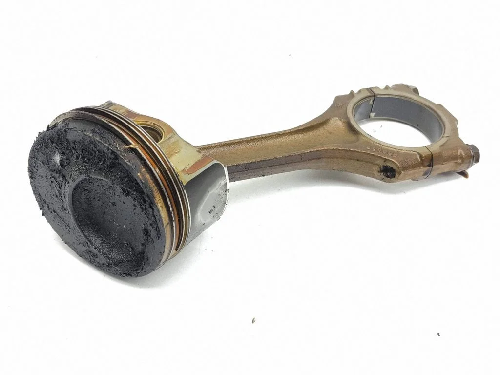 Piston with connecting rod