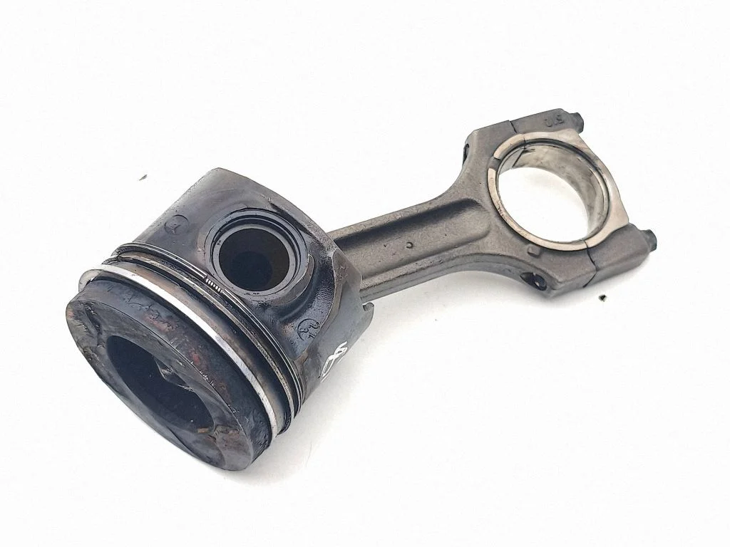 Piston with connecting rod